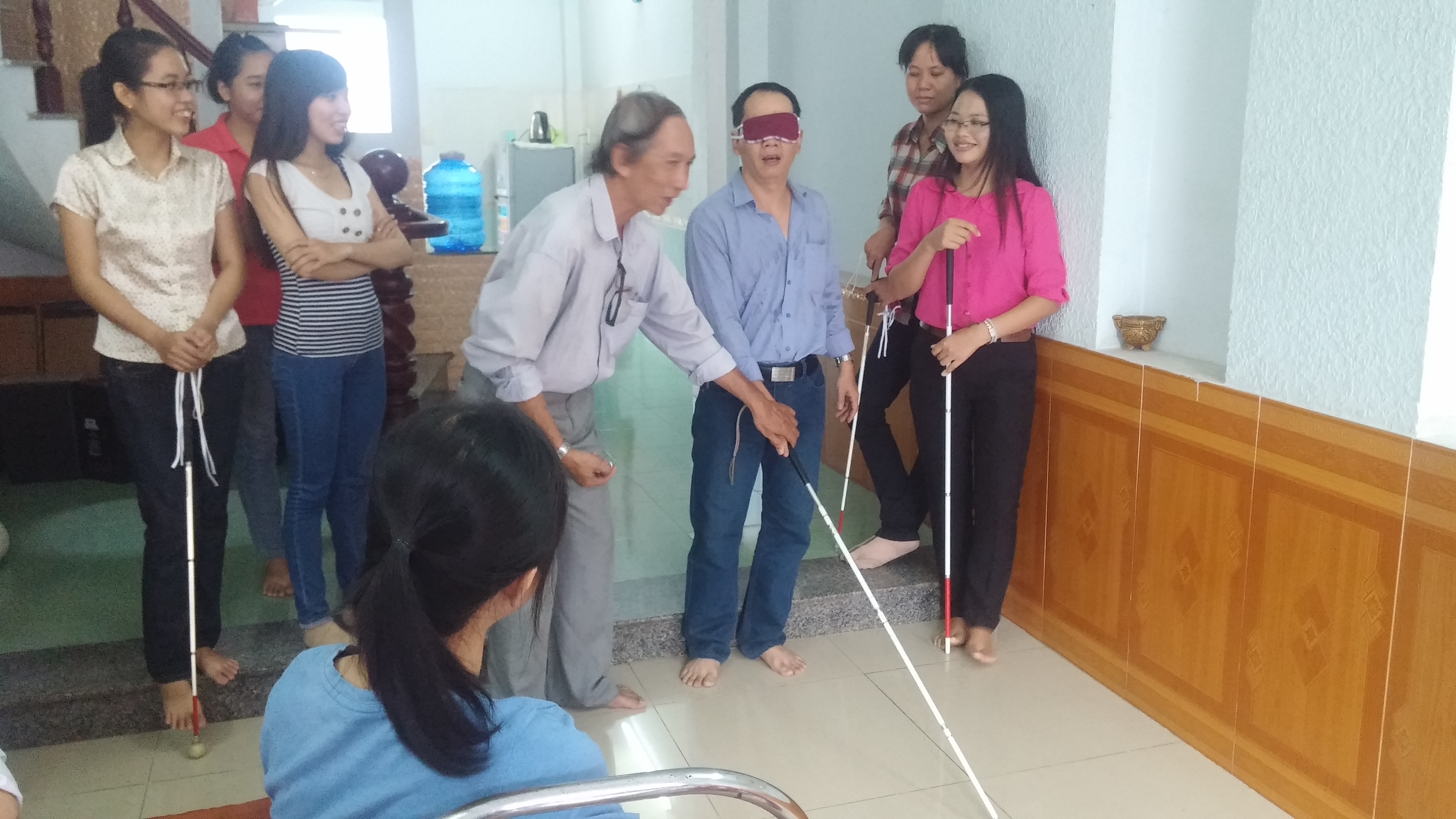 A session to train Orientation and Mobility Skills for volunteers at Sao Mai