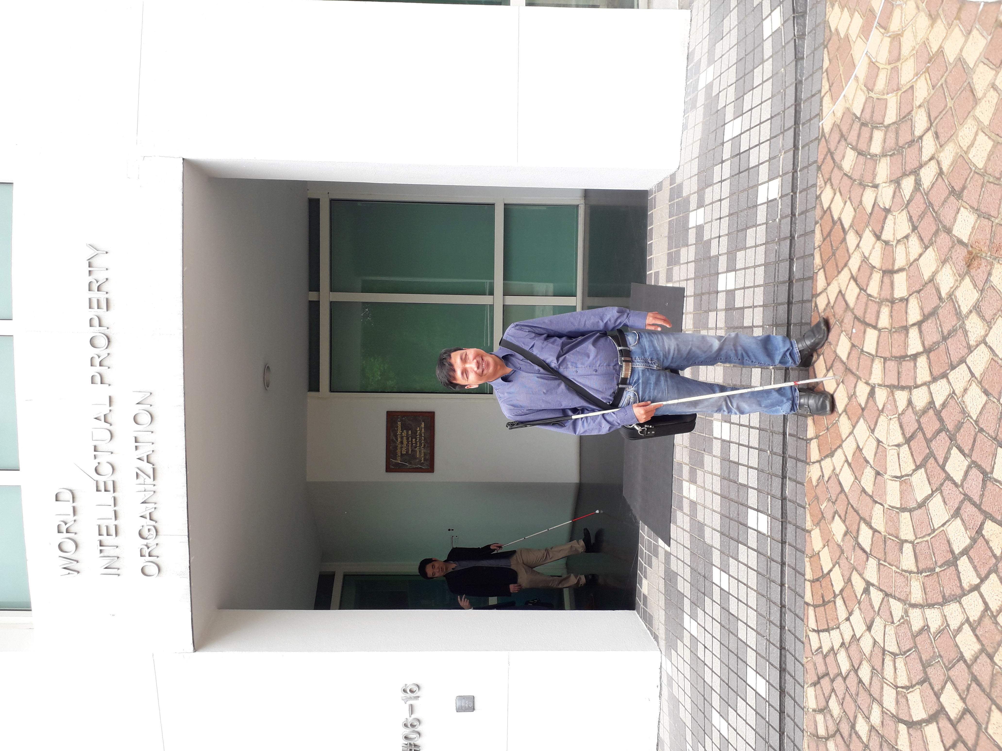 Mr. Phuc in front of Singapore WIPO office