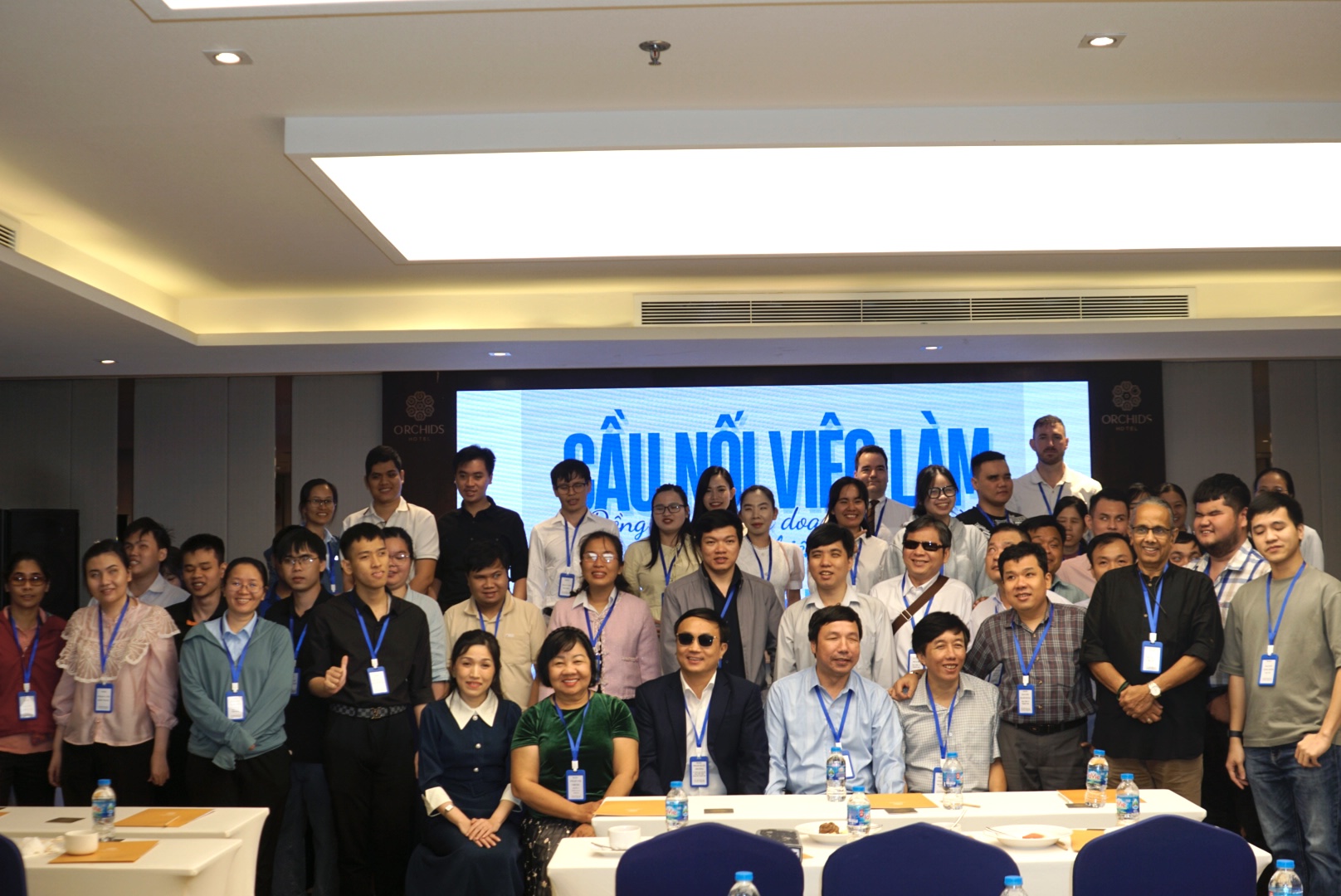 Delegates take a group photo at the conference