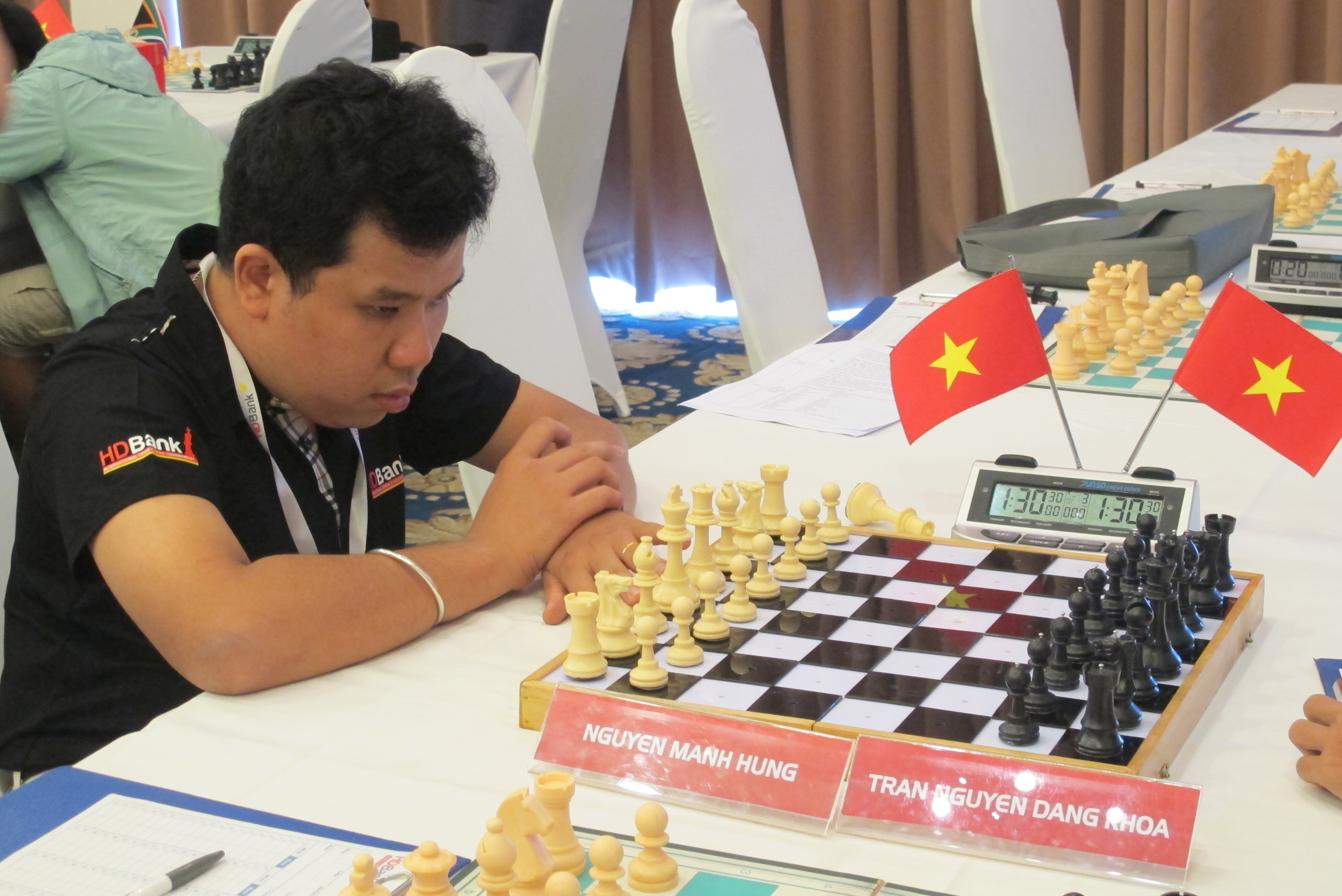 Nguyen Manh Hung competes in the HDBank international open chess tournament 