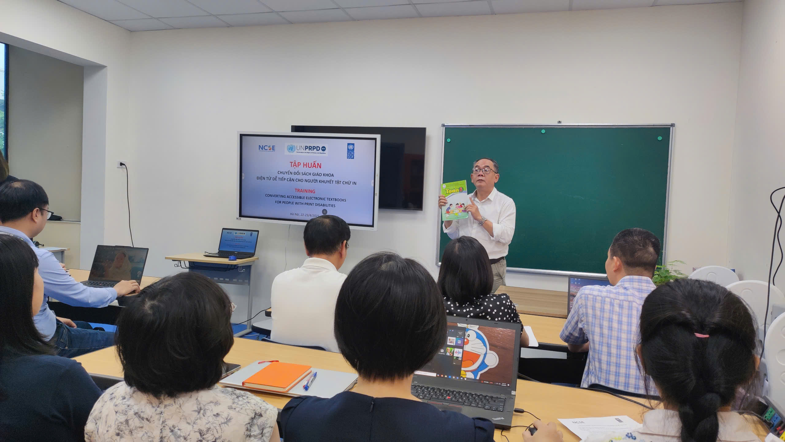 The trainer is conducting the session