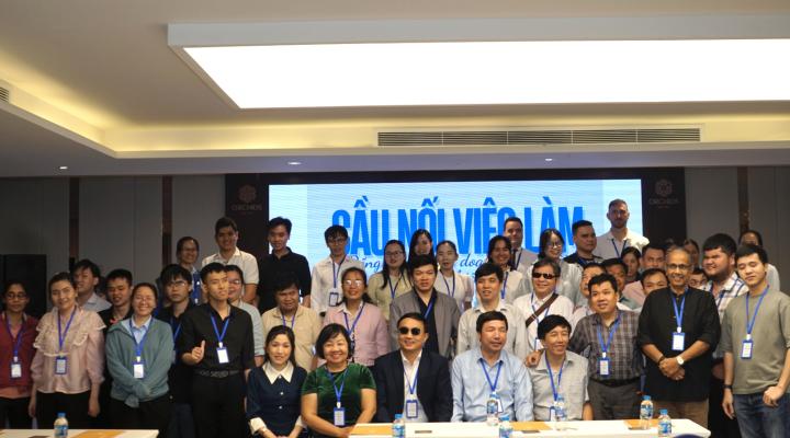 Delegates take a group photo at the conference